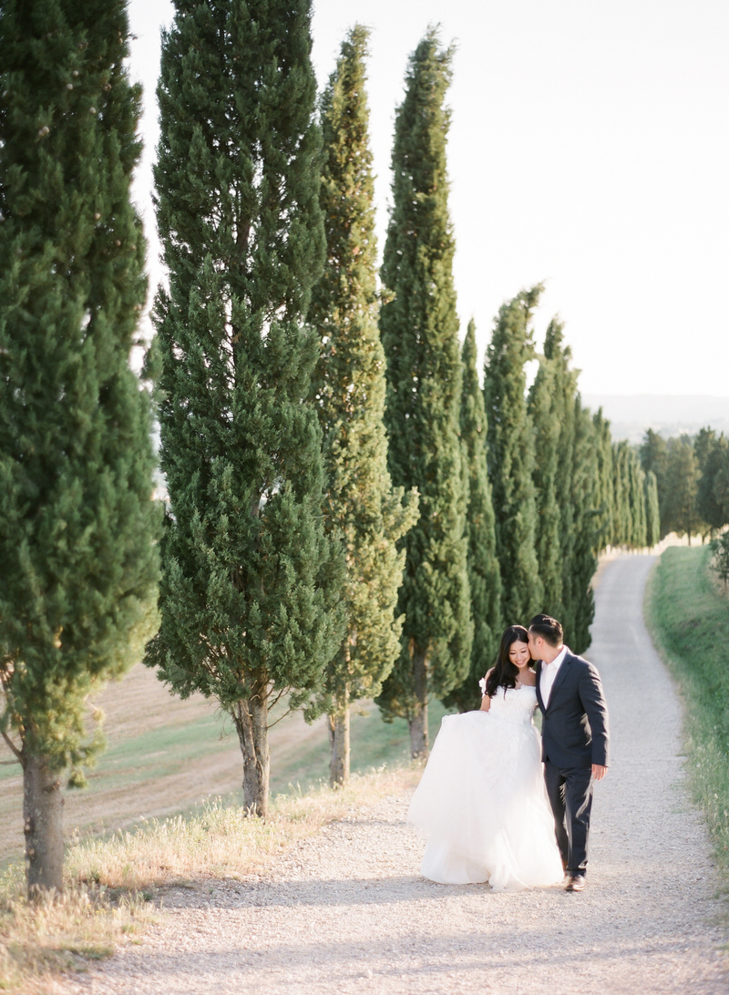 Cypress trees in tuscany prewedding shoot
